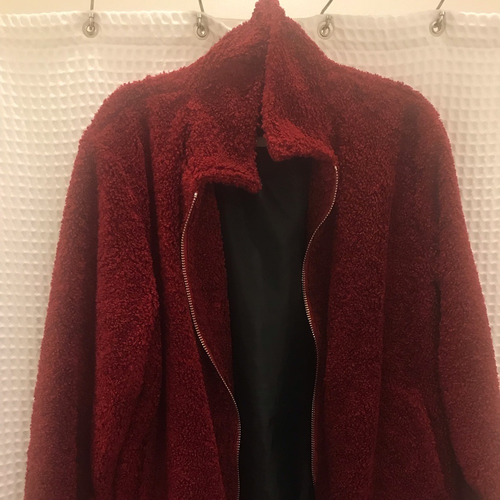 Sheepskin style jacket. Red